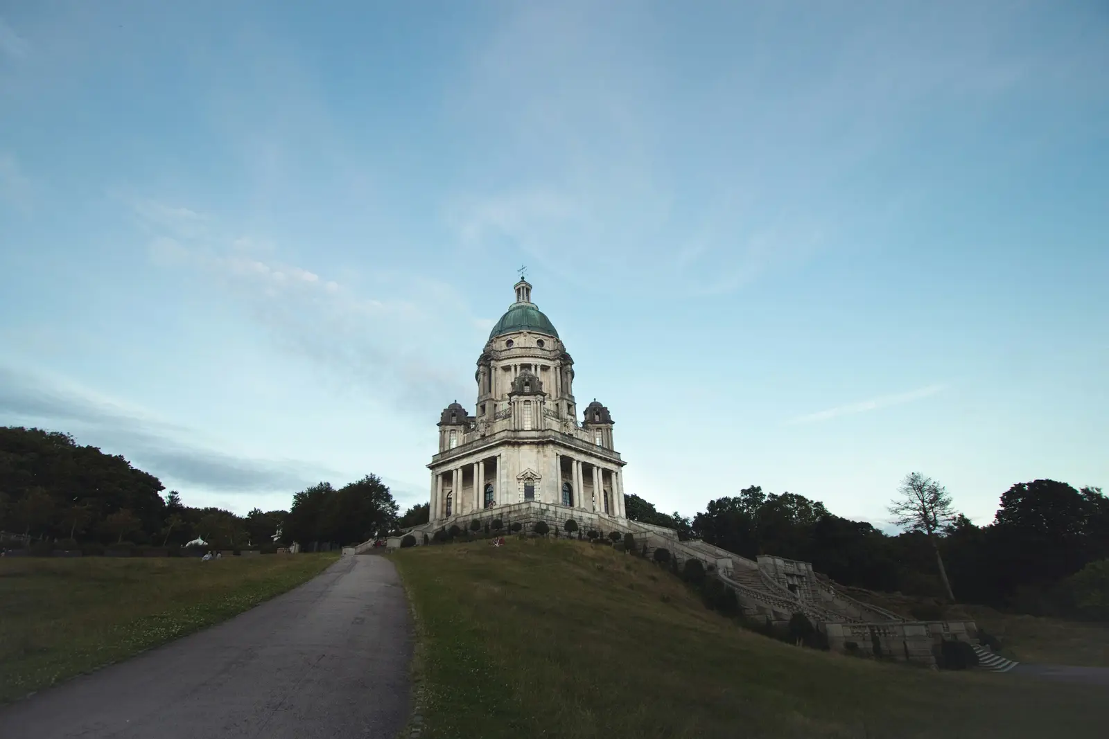 The domed Ashton Memorial in Williamson Park, Lancaster, with Morecambe Bay in the distance